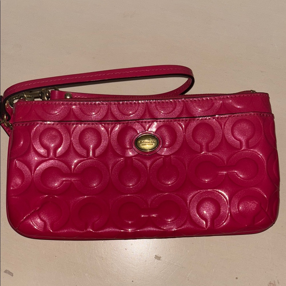 Pink Embossed Leather Wristlet
